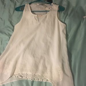 White sleeveless blouse